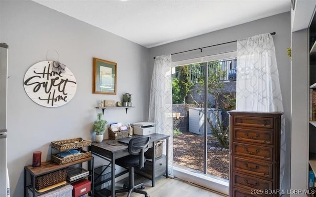 71 Costa Del Sol Dr Unit 207, Lake Ozark, MO 65049 - office area featuring wood finished floors