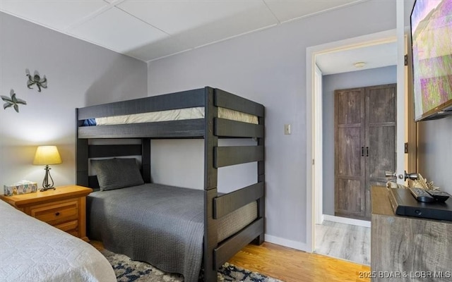 71 Costa Del Sol Dr Unit 207, Lake Ozark, MO 65049 - bedroom featuring light wood finished floors and baseboards