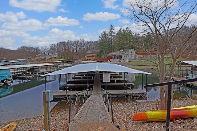 view of dock with boat lift