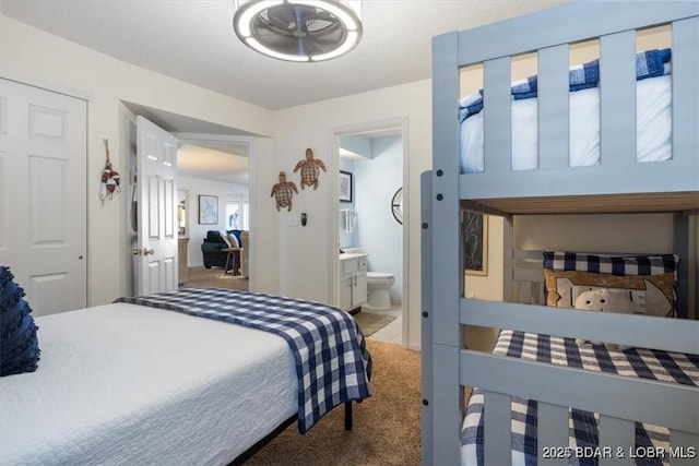 488 Regatta Bay Dr Unit 2C, Lake Ozark, MO 65049 - carpeted bedroom with ensuite bathroom