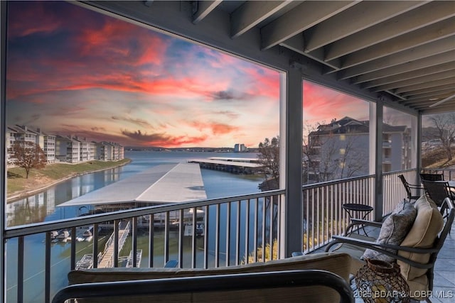 488 Regatta Bay Dr Unit 2C, Lake Ozark, MO 65049 - balcony at dusk with a water view