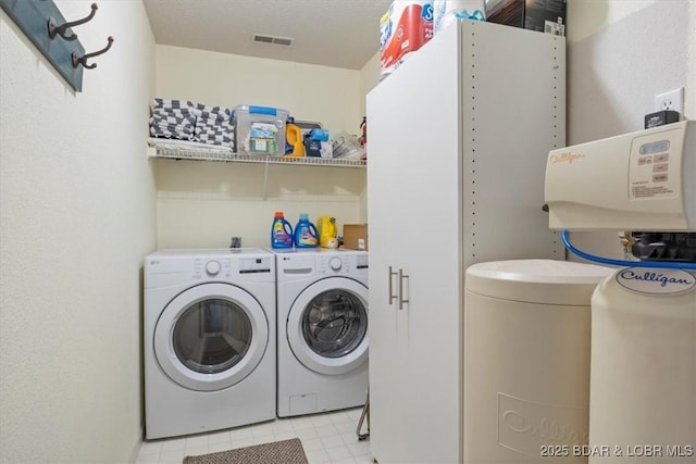 488 Regatta Bay Dr Unit 2C, Lake Ozark, MO 65049 - laundry area with washer and clothes dryer