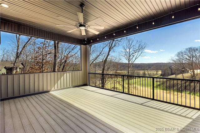 deck featuring a ceiling fan