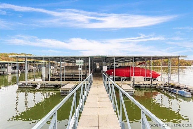 view of dock with a water view and boat lift