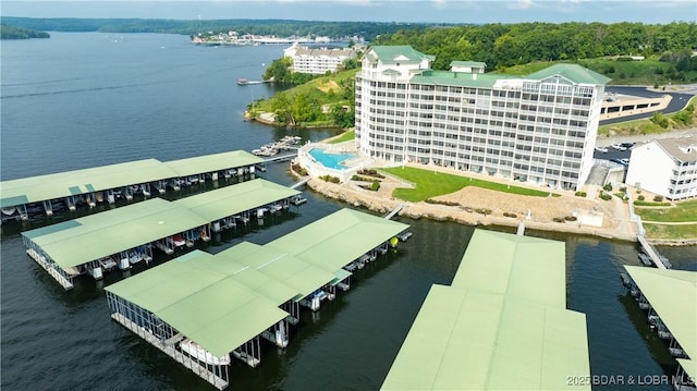 birds eye view of property featuring a water view