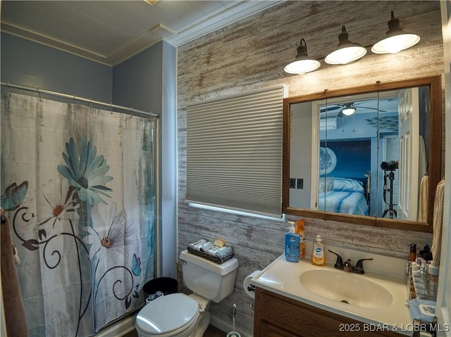 full bathroom with toilet, curtained shower, crown molding, and vanity