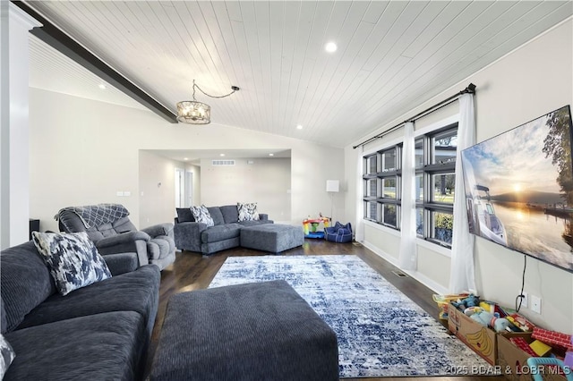 living room featuring visible vents, lofted ceiling with beams, wood finished floors, recessed lighting, and a chandelier