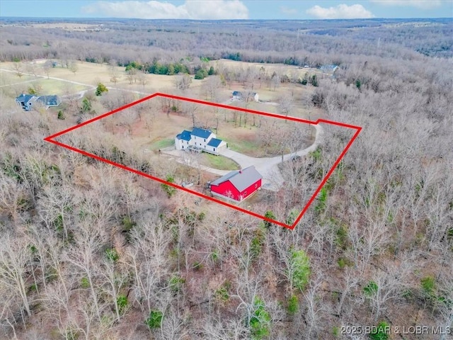 birds eye view of property featuring a rural view