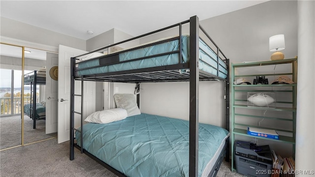 bedroom featuring a closet and carpet floors