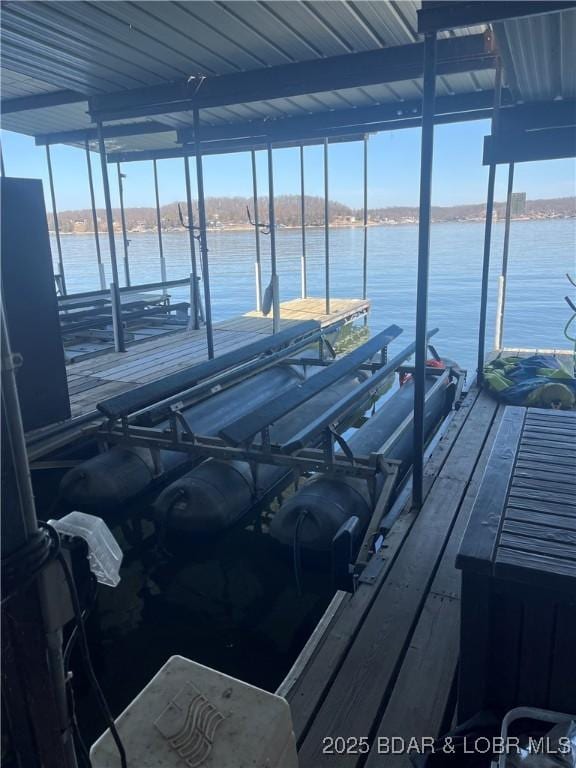 view of dock with a water view