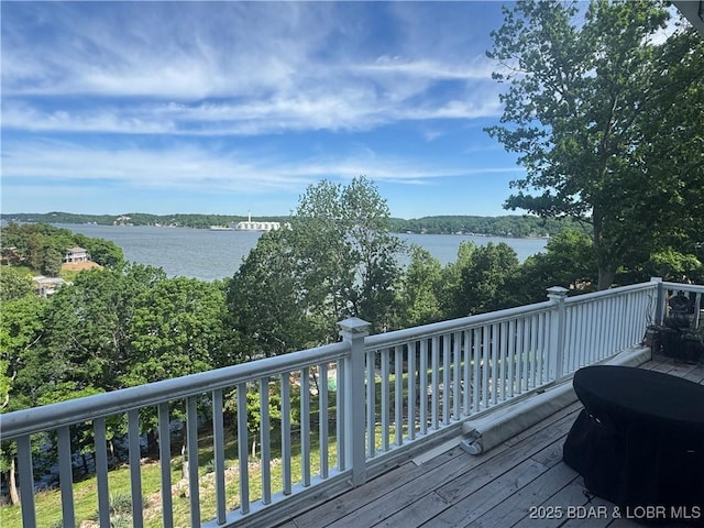 569 Cedar Rd Unit 5, Lake Ozark, MO 65049 - wooden deck with a water view