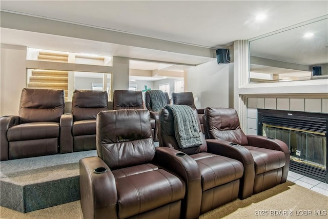 home theater featuring a fireplace and carpet flooring