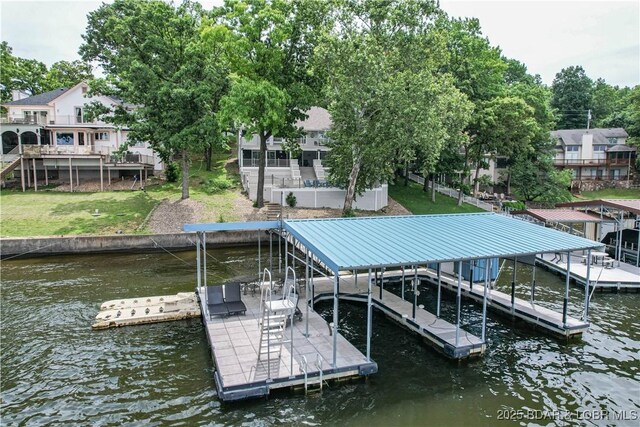 65 Sailaway Bay Dr, Sunrise Beach, MO 65079 - dock area with a water view and boat lift