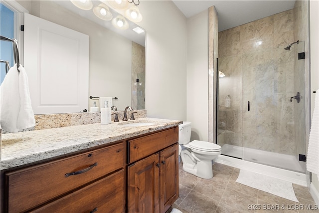 full bathroom featuring tile patterned floors, a shower stall, toilet, and vanity