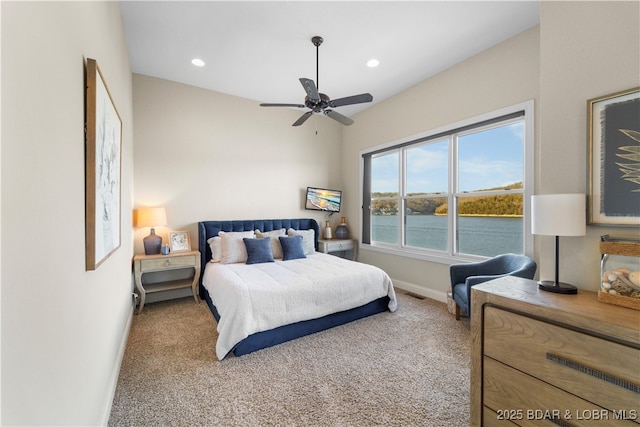 bedroom with a ceiling fan, visible vents, carpet, baseboards, and recessed lighting