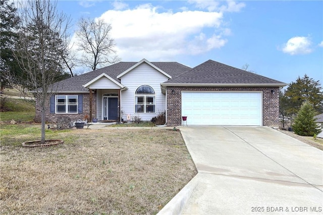 ranch-style home featuring brick siding, roof with shingles, concrete driveway, an attached garage, and a front yard