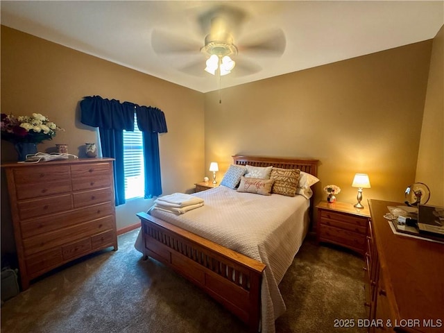 bedroom with a ceiling fan and carpet floors