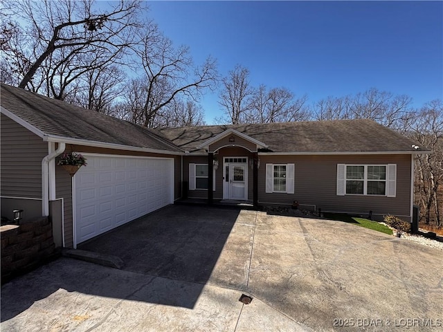 ranch-style house with a garage, aphalt driveway, and roof with shingles