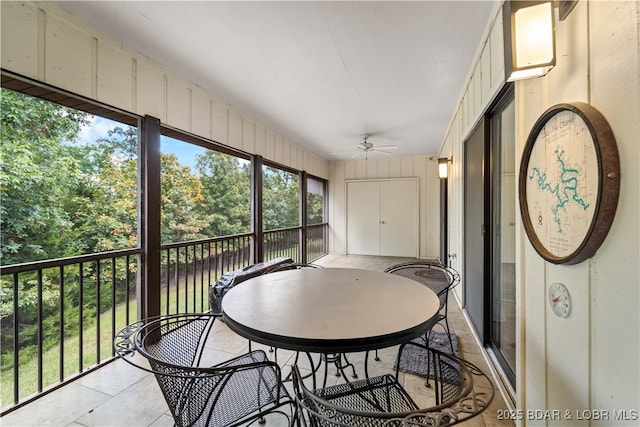 sunroom / solarium with ceiling fan