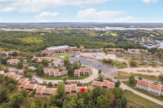 drone / aerial view featuring a water view