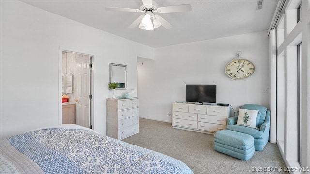 carpeted bedroom featuring visible vents and ceiling fan