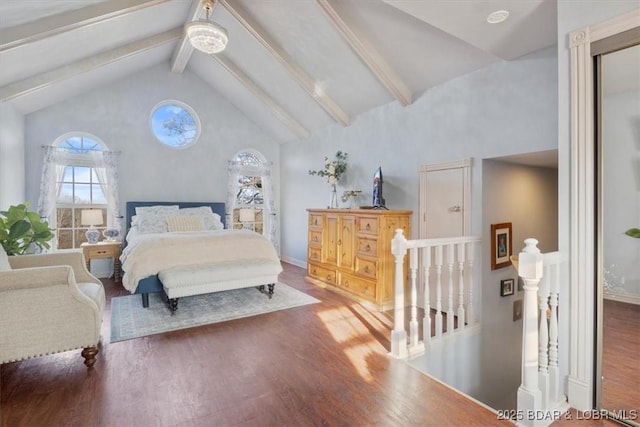 bedroom featuring beamed ceiling, high vaulted ceiling, and wood finished floors