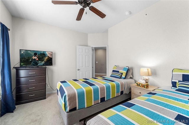 bedroom with light carpet, baseboards, and ceiling fan