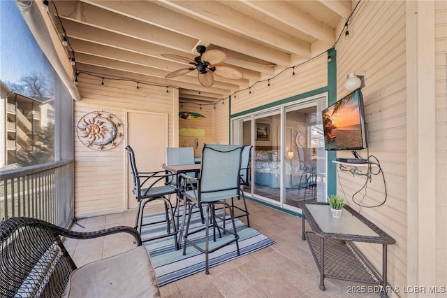 view of patio / terrace featuring outdoor dining space and ceiling fan