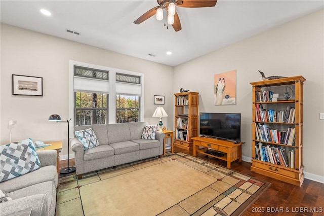 living area with visible vents, wood finished floors, recessed lighting, baseboards, and ceiling fan