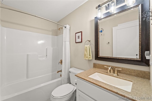 bathroom with vanity, toilet, and shower / tub combo with curtain