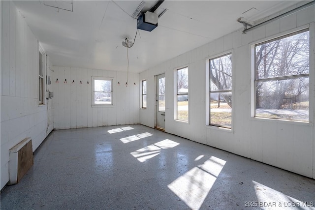 unfurnished room with speckled floor