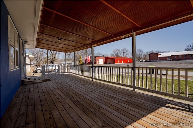 409 S Walnut St, Versailles, MO 65084 - view of wooden deck