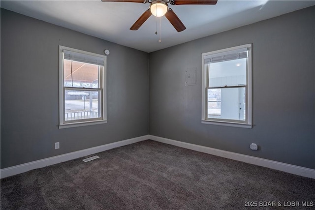 409 S Walnut St, Versailles, MO 65084 - carpeted empty room with ceiling fan and baseboards