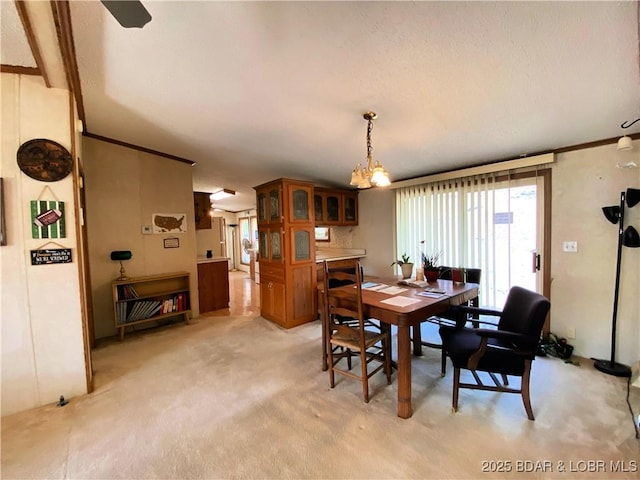 dining room featuring light colored carpet