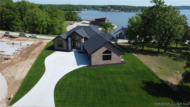 view from above of property with a large body of water