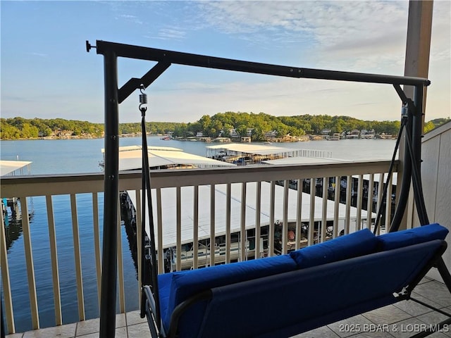 balcony featuring a water view