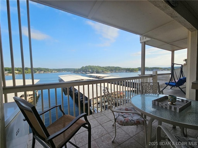 balcony featuring a water view