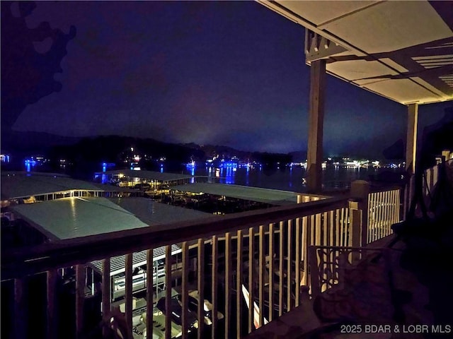 view of balcony at twilight