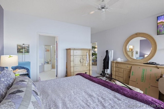 bedroom featuring ensuite bathroom and ceiling fan