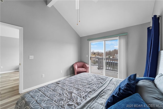 bedroom featuring access to outside, vaulted ceiling, wood finished floors, baseboards, and ceiling fan