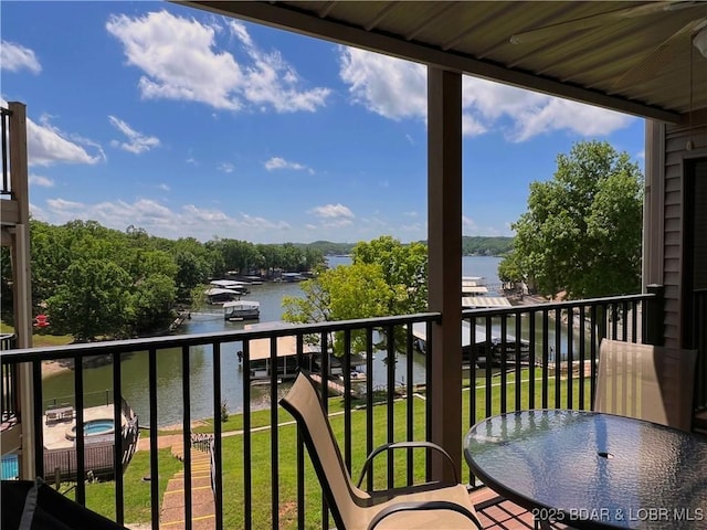 balcony featuring a water view