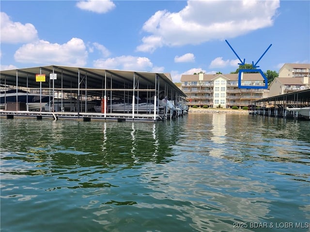 dock area featuring a water view