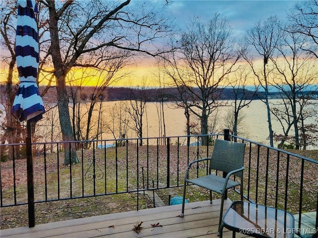 view of balcony at dusk