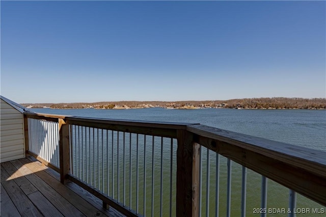 deck featuring a water view