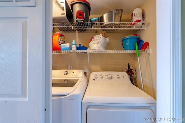 laundry room featuring independent washer and dryer and laundry area