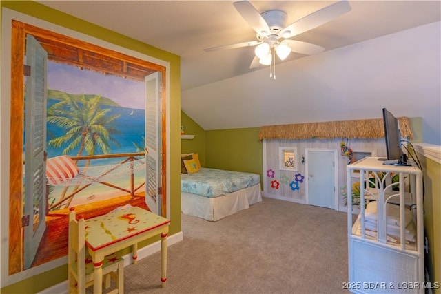 carpeted bedroom with lofted ceiling and a ceiling fan