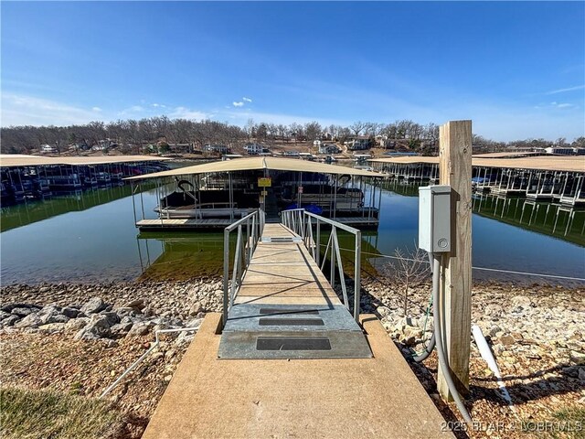dock area featuring a water view