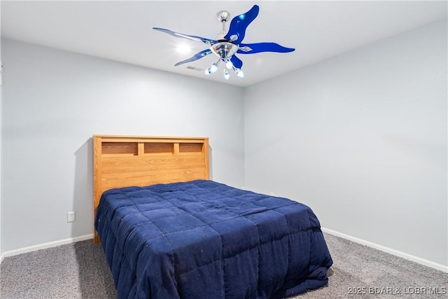 bedroom featuring visible vents, baseboards, carpet, and a ceiling fan