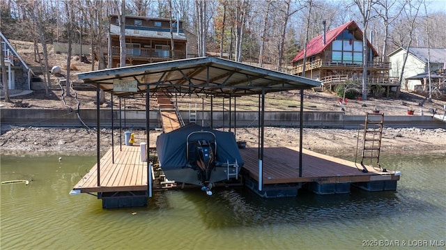 dock area featuring a water view