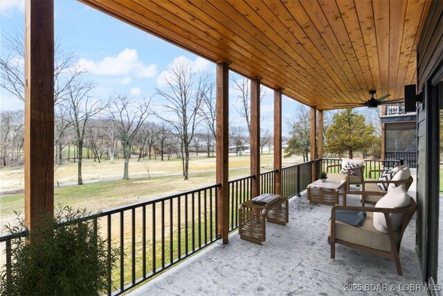 view of patio / terrace with a porch and a ceiling fan